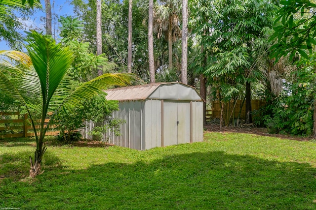 view of outdoor structure with a yard