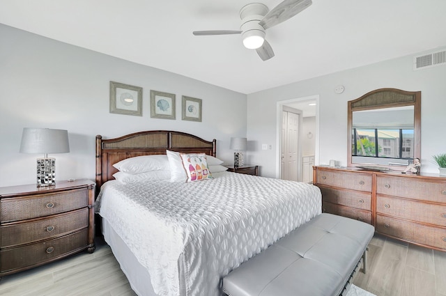 bedroom with a closet, ceiling fan, and light hardwood / wood-style flooring