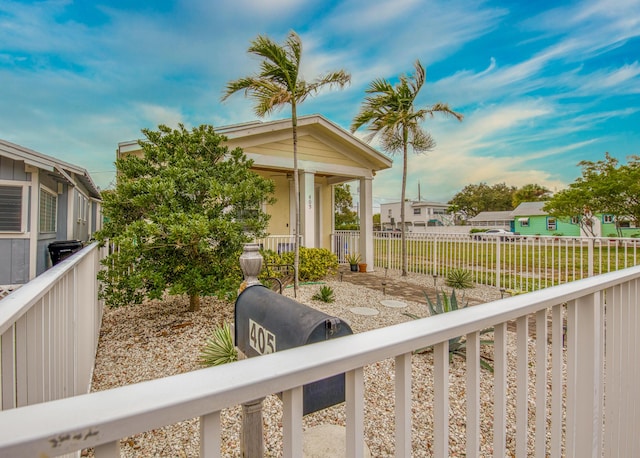 exterior space featuring a residential view and fence private yard