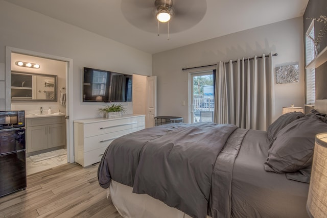 bedroom with ceiling fan, ensuite bathroom, light wood-type flooring, and access to exterior