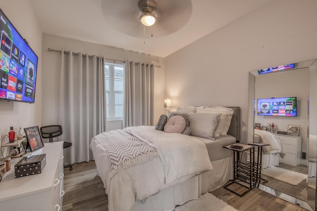 bedroom with ceiling fan and wood finished floors