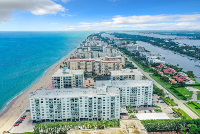 aerial view featuring a water view and a beach view