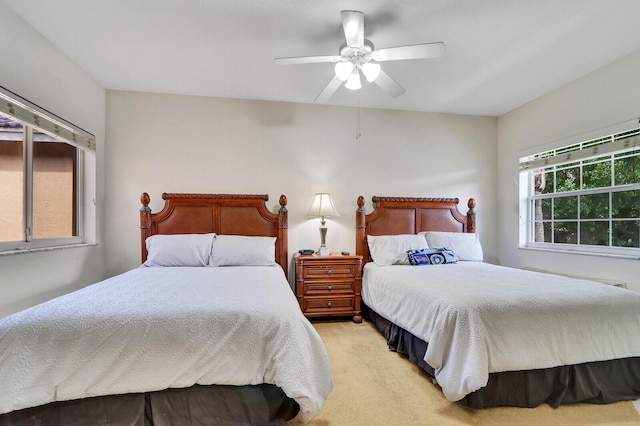 8010 Carnoustie Pl Unit 4022, Port Saint Lucie, FL 34986 - bedroom with light colored carpet and ceiling fan