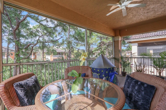 8010 Carnoustie Pl Unit 4022, Port Saint Lucie, FL 34986 - sunroom featuring outdoor dining space and a ceiling fan