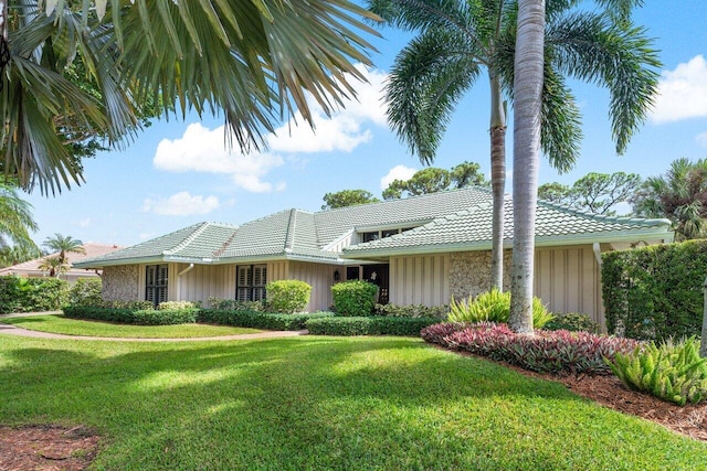 view of front of home with a front yard