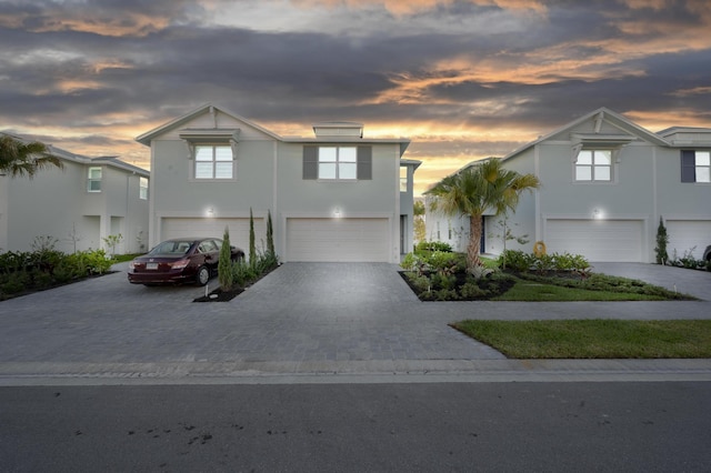 view of front of property featuring a garage