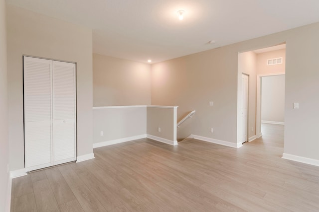 empty room with light wood-type flooring