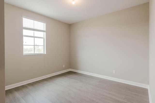 empty room with light wood-type flooring