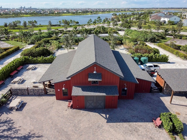 drone / aerial view with a water view