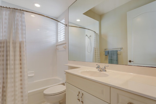 full bathroom featuring shower / tub combo with curtain, vanity, and toilet