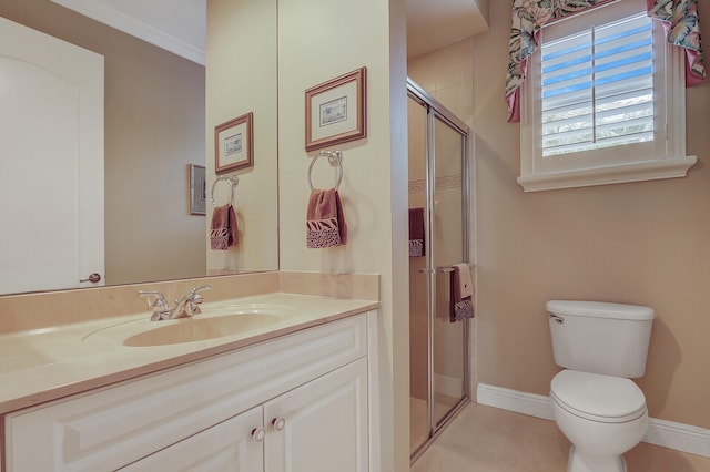 bathroom with tile patterned flooring, walk in shower, crown molding, vanity, and toilet