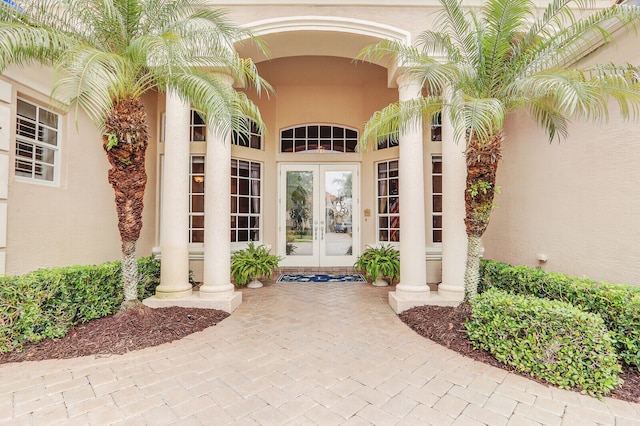 property entrance featuring french doors