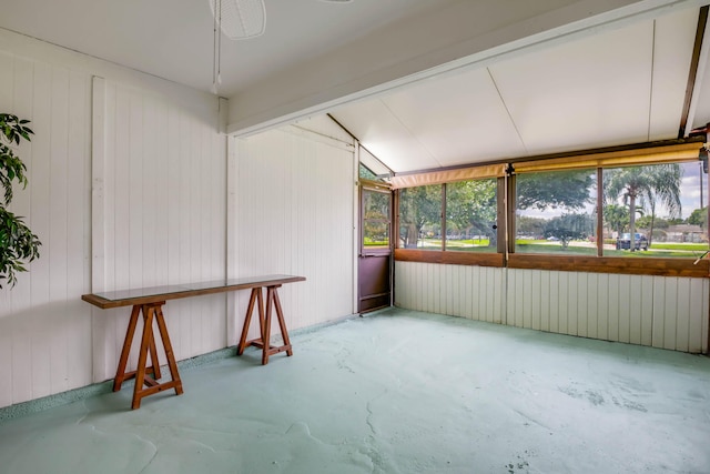 sunroom / solarium with lofted ceiling