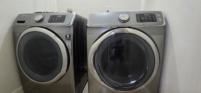 laundry room featuring washer and dryer