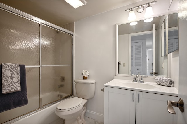 full bathroom with vanity, toilet, and combined bath / shower with glass door