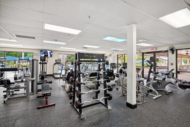 workout area with a drop ceiling