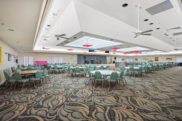 dining area with carpet floors and ceiling fan