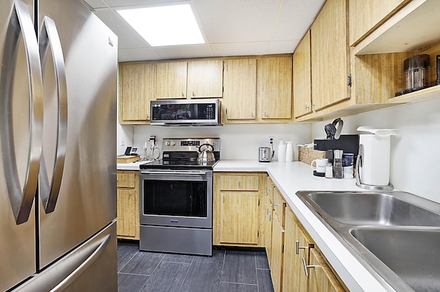 1401 S Federal Hwy Unit 411, Boca Raton, FL 33432 - kitchen featuring a sink, light countertops, appliances with stainless steel finishes, dark wood-style floors, and a paneled ceiling