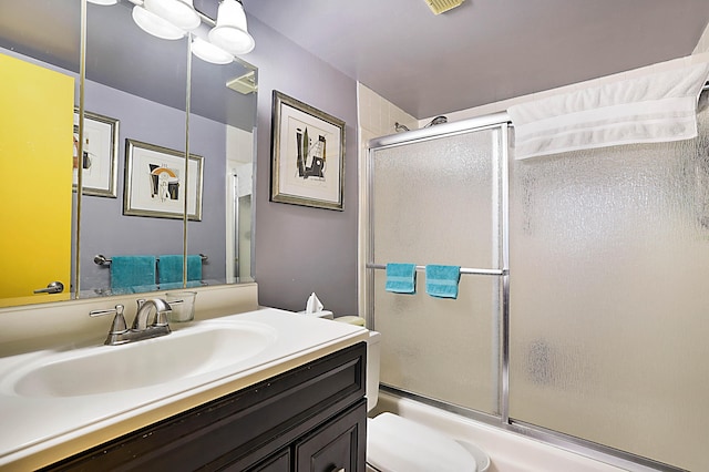 1401 S Federal Hwy Unit 411, Boca Raton, FL 33432 - full bathroom featuring toilet, vanity, and bath / shower combo with glass door