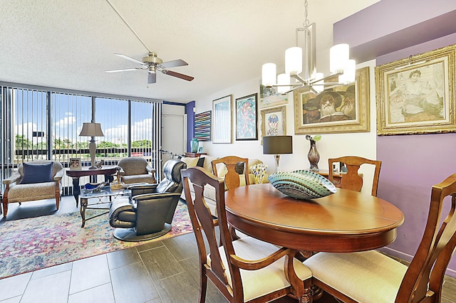 1401 S Federal Hwy Unit 411, Boca Raton, FL 33432 - dining area featuring a textured ceiling and ceiling fan with notable chandelier