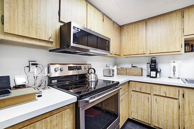 1401 S Federal Hwy Unit 411, Boca Raton, FL 33432 - kitchen featuring light countertops, appliances with stainless steel finishes, and light brown cabinets