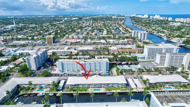 drone / aerial view with a water view