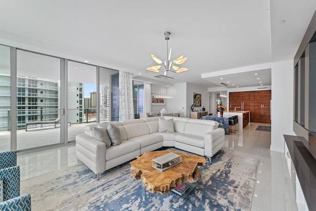 tiled living room featuring a chandelier and indoor bar