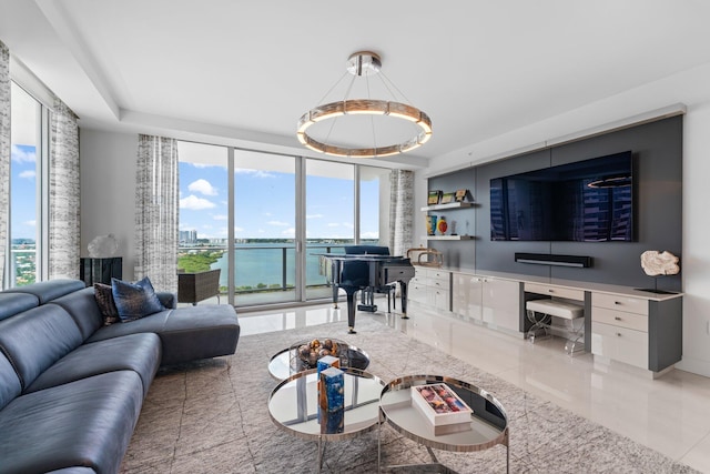 tiled living room featuring a notable chandelier