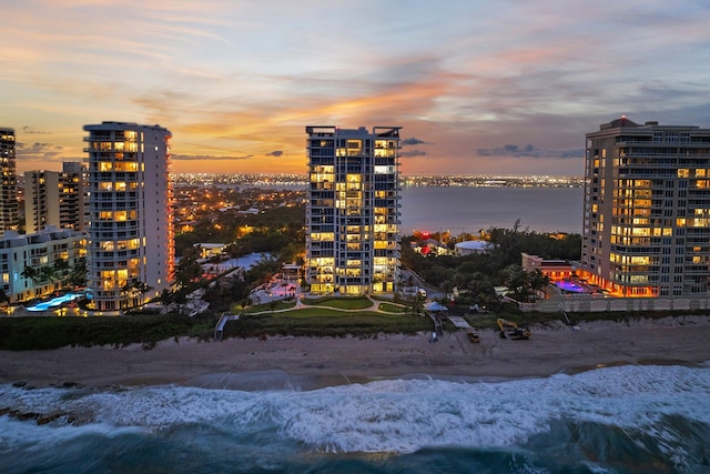 city view featuring a water view and a beach view