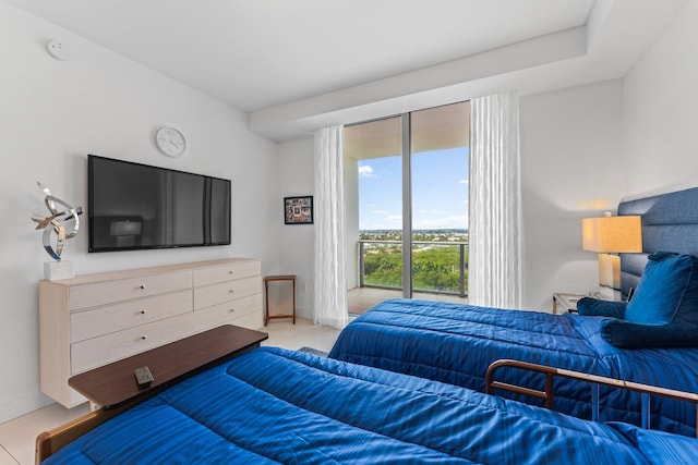 bedroom with light tile patterned floors