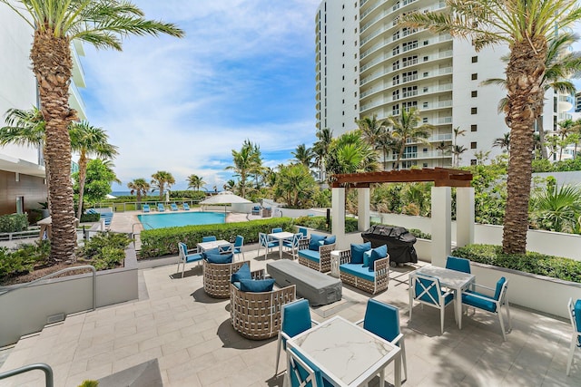 view of patio / terrace with an outdoor hangout area and a community pool