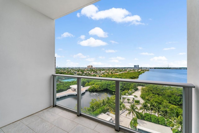 balcony featuring a water view