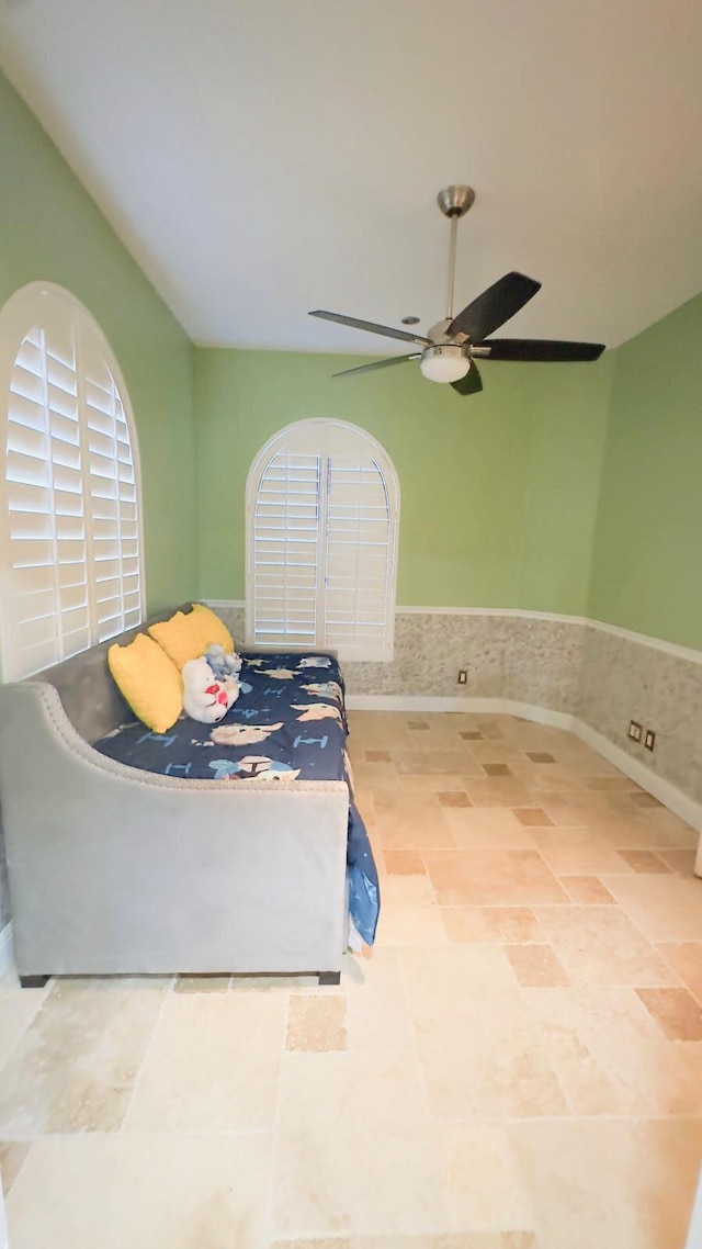 bedroom featuring ceiling fan