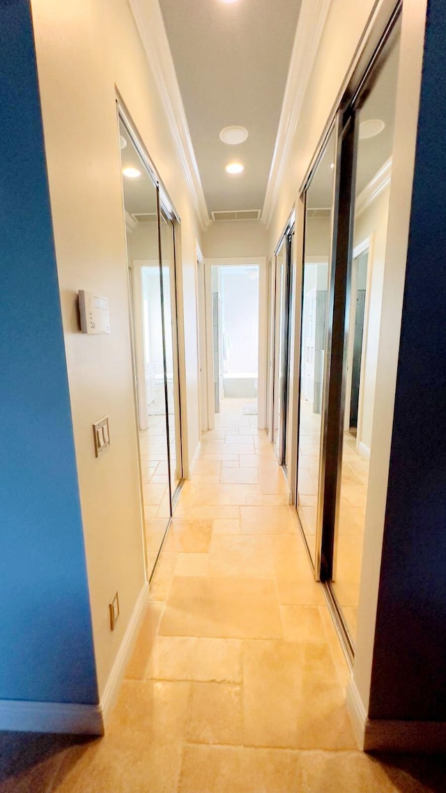 hallway with crown molding