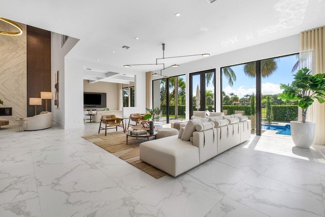 living room with a chandelier