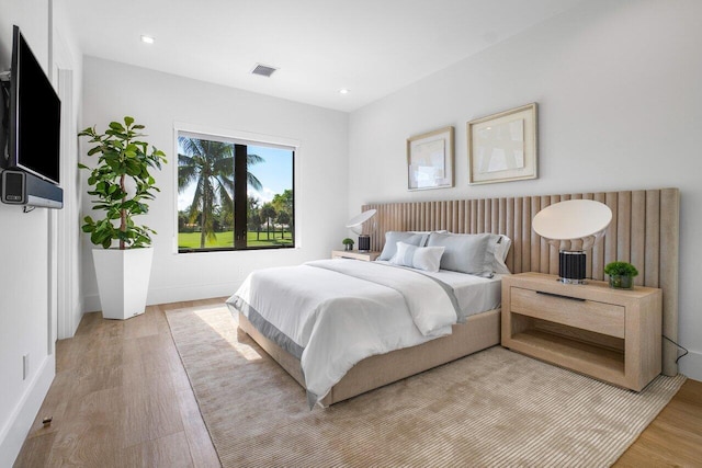 bedroom featuring light hardwood / wood-style floors