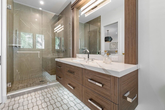 bathroom with vanity and an enclosed shower