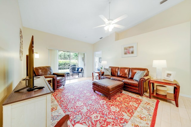 living room featuring high vaulted ceiling and ceiling fan