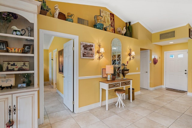 119 Club Dr, Palm Beach Gardens, FL 33418 - foyer with light tile patterned floors, visible vents, and ornamental molding