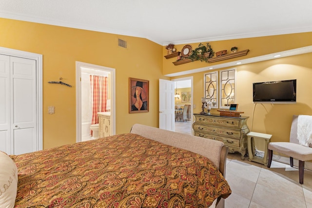 119 Club Dr, Palm Beach Gardens, FL 33418 - bedroom with light tile patterned floors, visible vents, ornamental molding, vaulted ceiling, and a closet