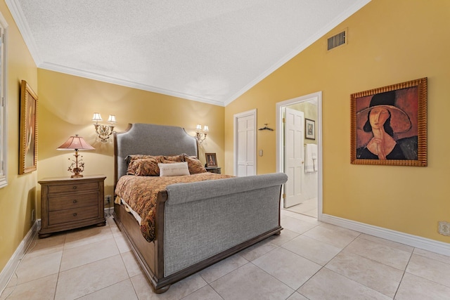 119 Club Dr, Palm Beach Gardens, FL 33418 - bedroom with visible vents, ornamental molding, vaulted ceiling, light tile patterned flooring, and a textured ceiling