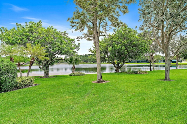 119 Club Dr, Palm Beach Gardens, FL 33418 - view of yard featuring a water view