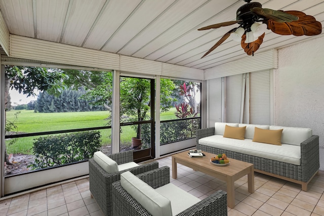 sunroom featuring wooden ceiling and ceiling fan