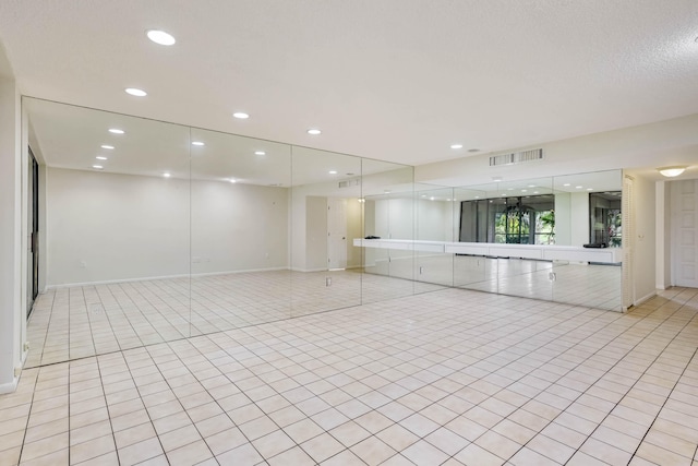 interior space with light tile patterned floors