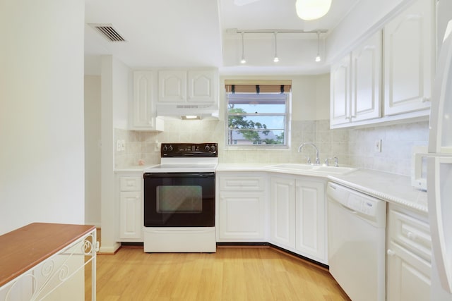 kitchen with white cabinetry, range with electric stovetop, light hardwood / wood-style floors, and dishwasher