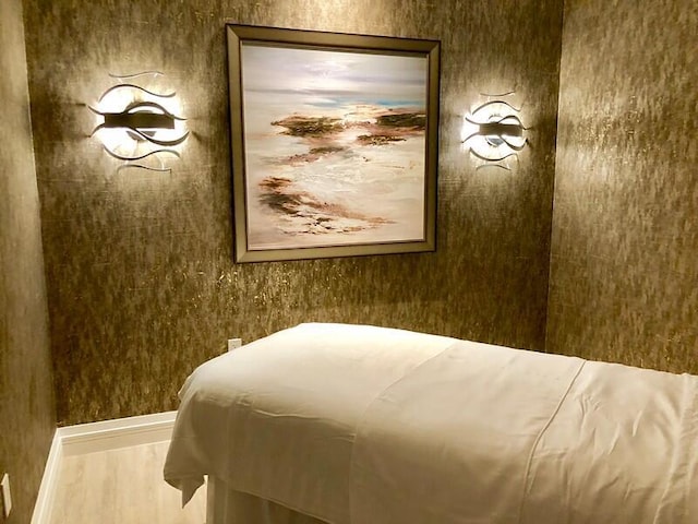 bedroom featuring wood-type flooring