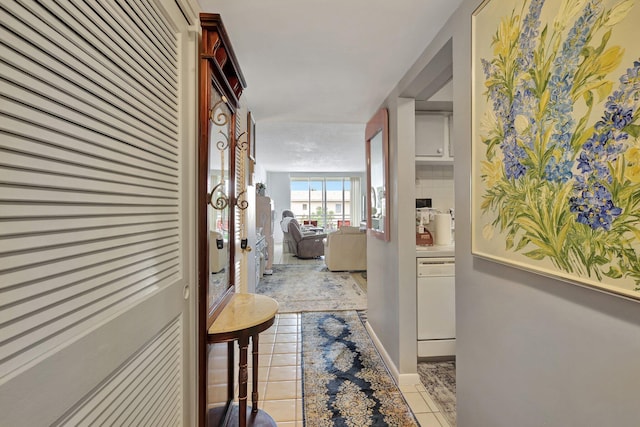 hallway with light tile patterned flooring