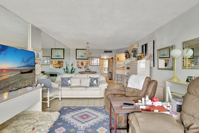 tiled living room with a textured ceiling