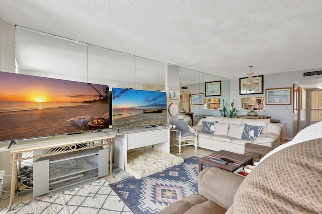 living room with a textured ceiling