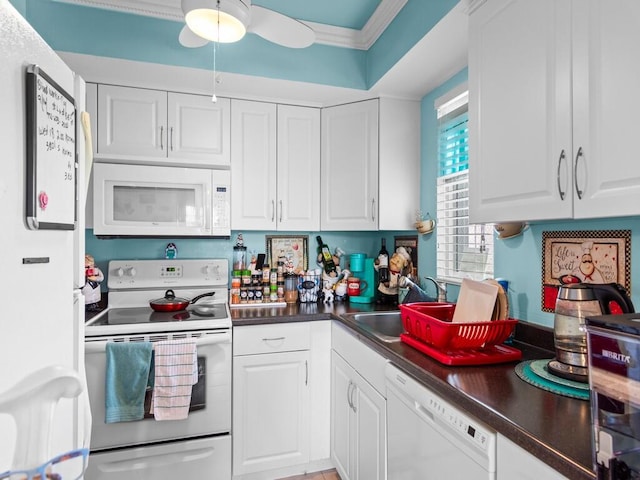 kitchen featuring white cabinets, white appliances, crown molding, ceiling fan, and sink